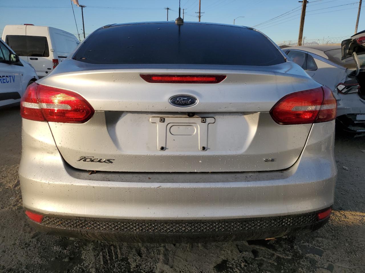 2018 Ford Focus VIN 1FADP3F26JL254079 Copart auction photo, front end / side damage thumbnail 6