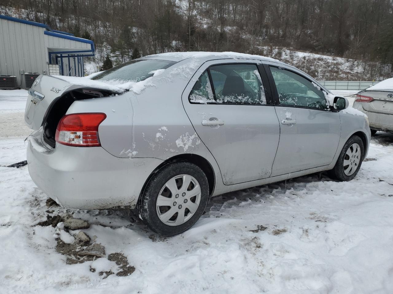 2011 Toyota Yaris VIN JTDBT4K37B1401590 Copart auction photo, rear end damage thumbnail 3
