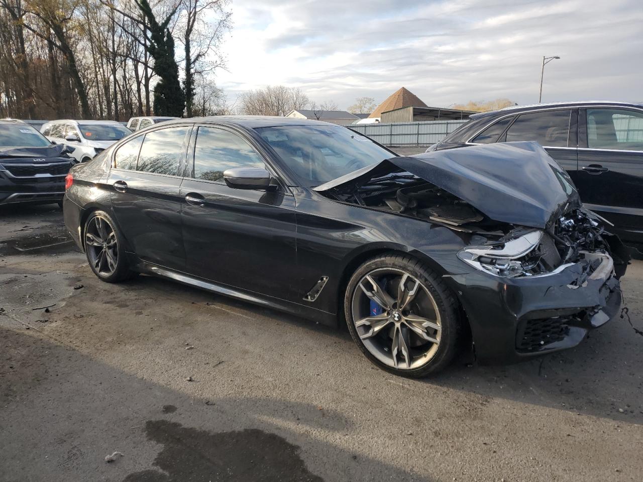 2018 BMW M5 VIN WBAJB9C57JB049127 Copart auction photo, front end damage thumbnail 4