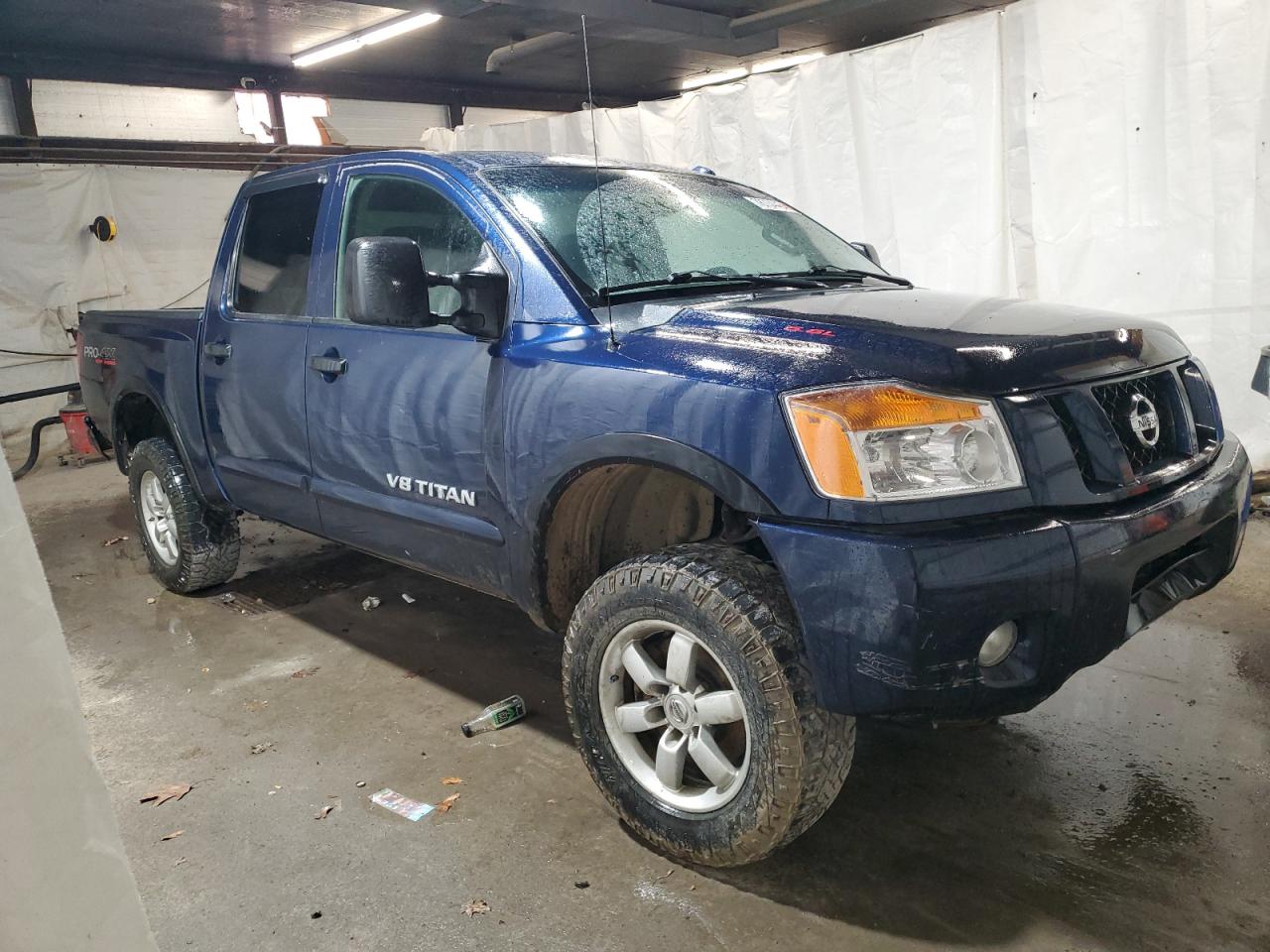 2012 Nissan Titan VIN 1N6AA0EC3CN329137 Copart auction photo, front end damage thumbnail 4