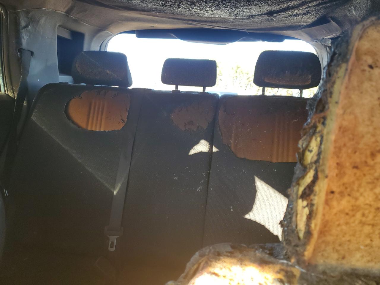 2009 Toyota xB VIN JTLKE50E191070346 Copart auction photo, burn damage thumbnail 10
