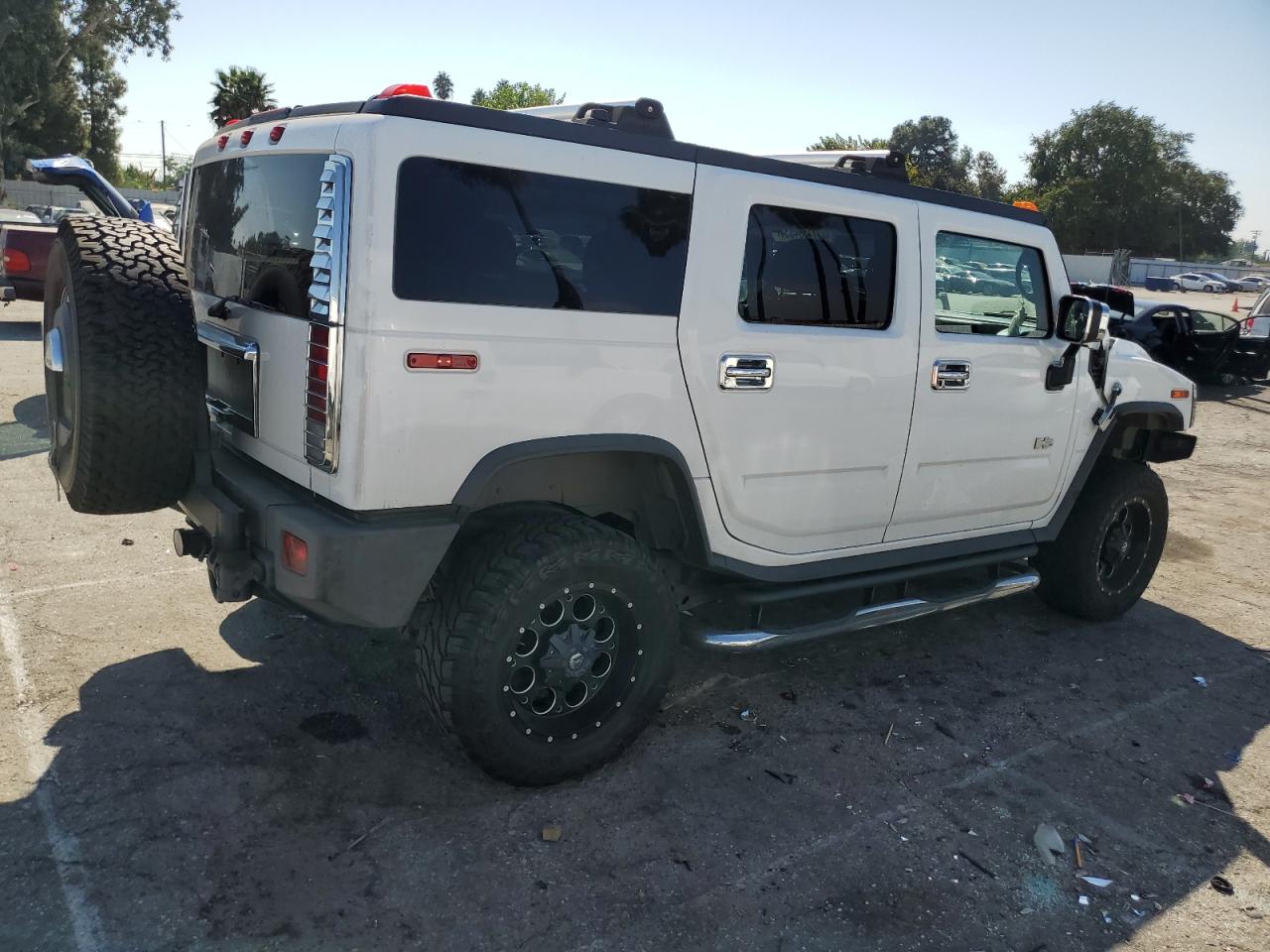 2005 Hummer H2 VIN 5GRGN23U35H132428 Copart auction photo, front end / minor dent/scratches damage thumbnail 3