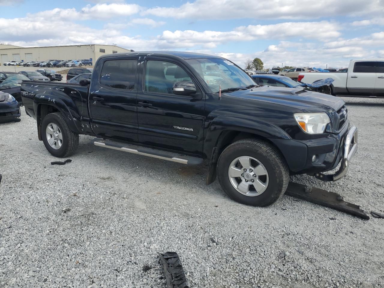 2015 Toyota Tacoma VIN 5TFKU4HN9FX007212 Copart auction photo, rear end / front end damage thumbnail 4