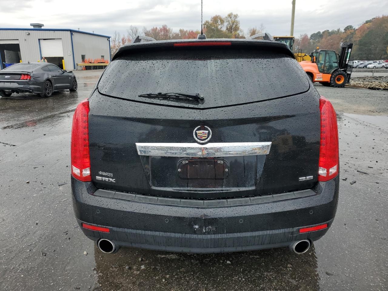 2016 Cadillac SRX VIN 3GYFNBE31GS533689 Copart auction photo, side / front end damage thumbnail 6