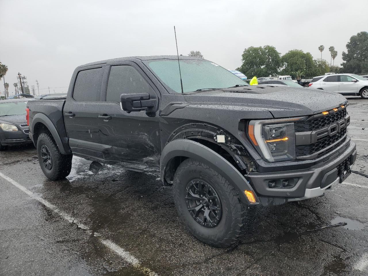 2023 Ford F-150 VIN 1FTFW1RG6PFA01658 Copart auction photo, side / front end damage thumbnail 4