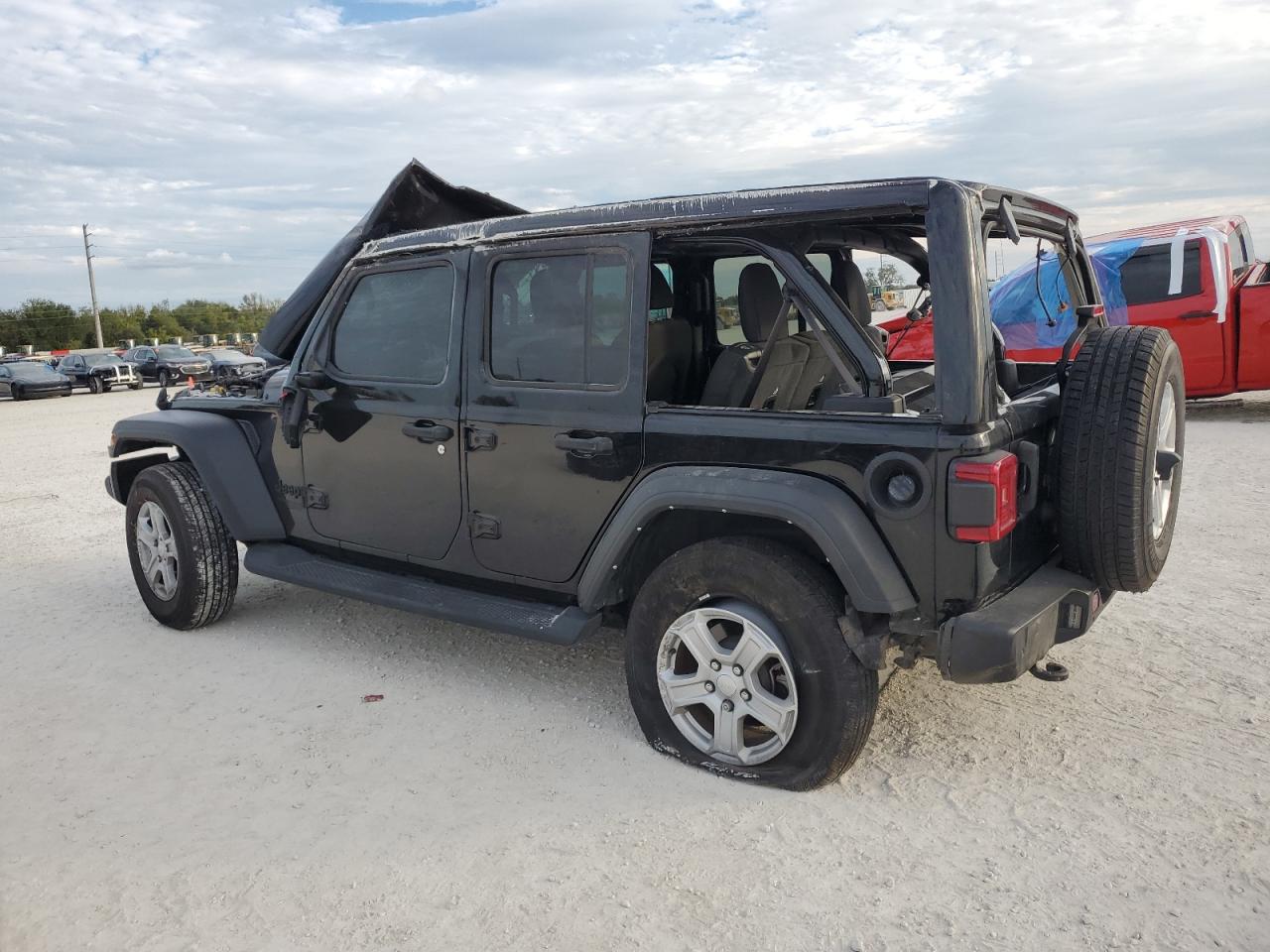 2021 Jeep Wrangler VIN 1C4HJXDG2MW831728 Copart auction photo, all over damage thumbnail 2