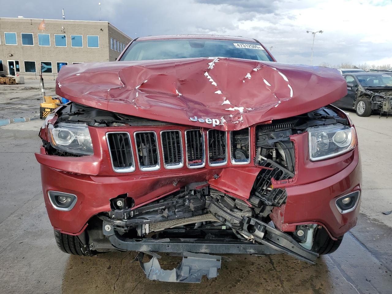 2015 Jeep Grand Cherokee VIN 1C4RJFBG9FC134465 Copart auction photo, front end / side damage thumbnail 5