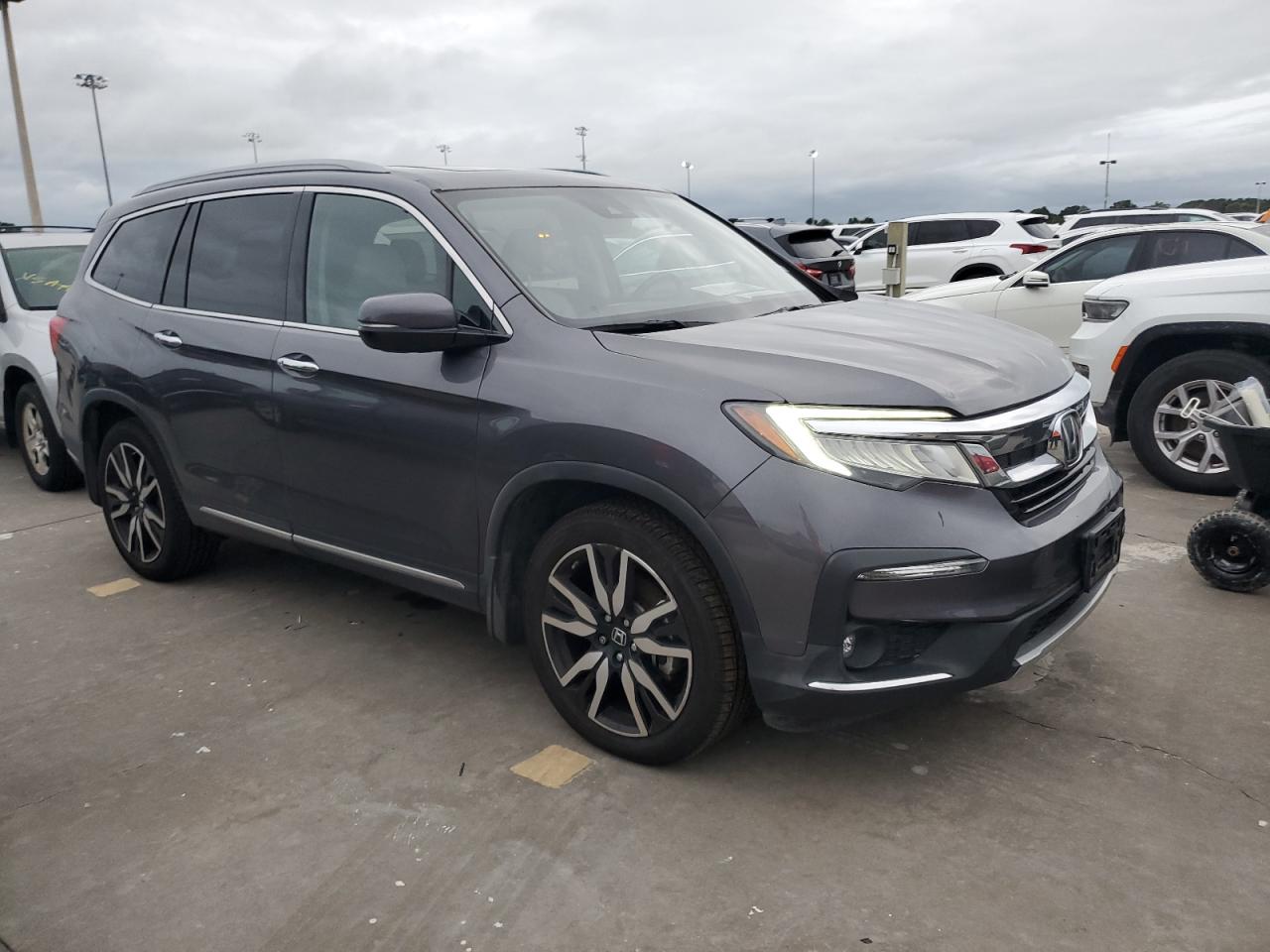 2022 Honda Pilot VIN 5FNYF6H96NB007857 Copart auction photo, water/flood damage thumbnail 4