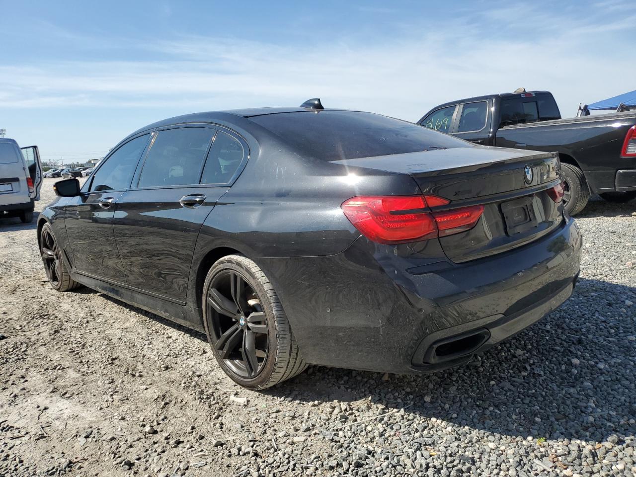 2017 BMW 7er VIN WBA7F2C58HG422548 Copart auction photo, normal wear / minor dent/scratches damage thumbnail 2