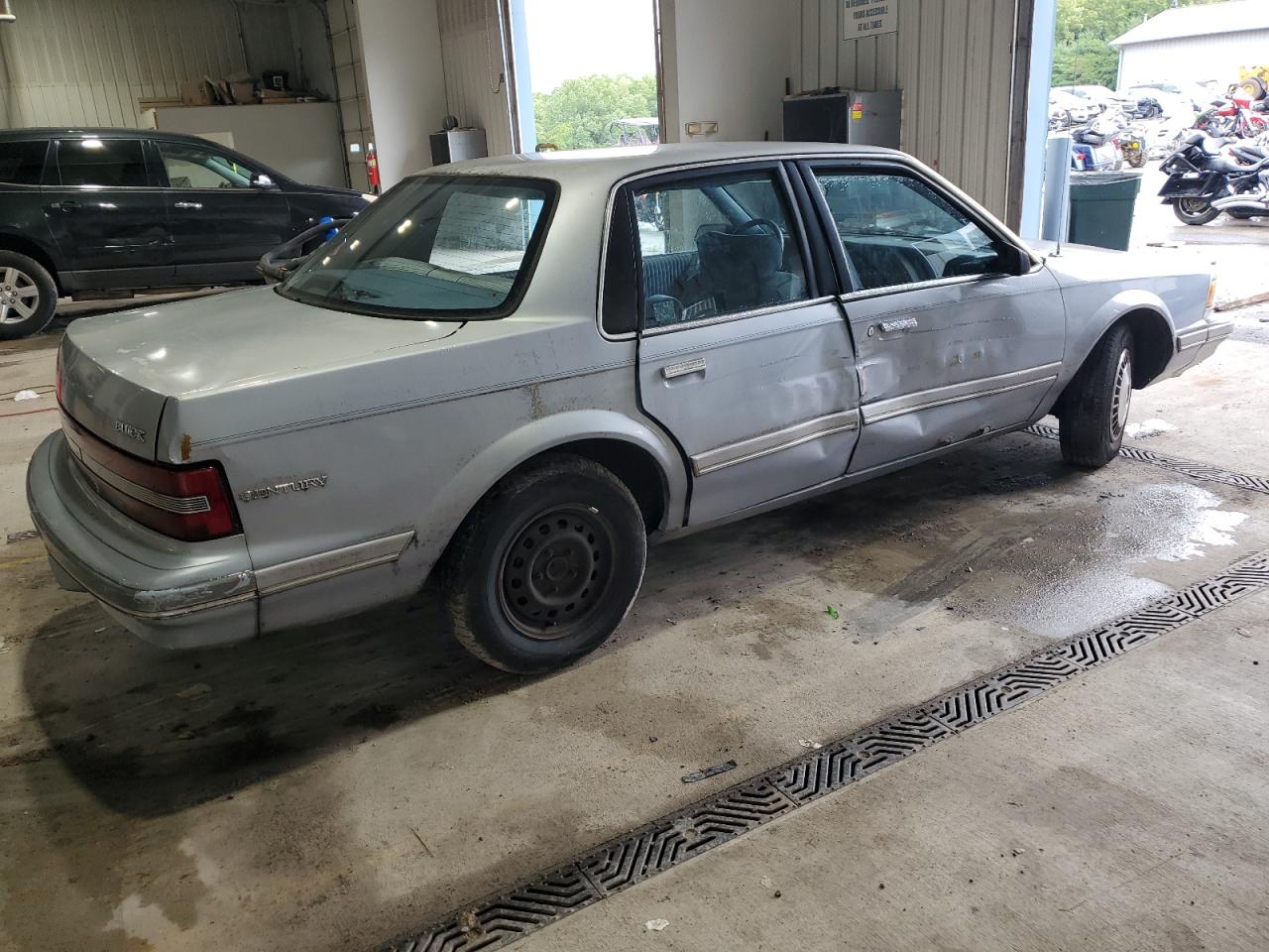 1994 Buick Century VIN 1G4AG55M8R6411192 Copart auction photo, side / minor dent/scratches damage thumbnail 3