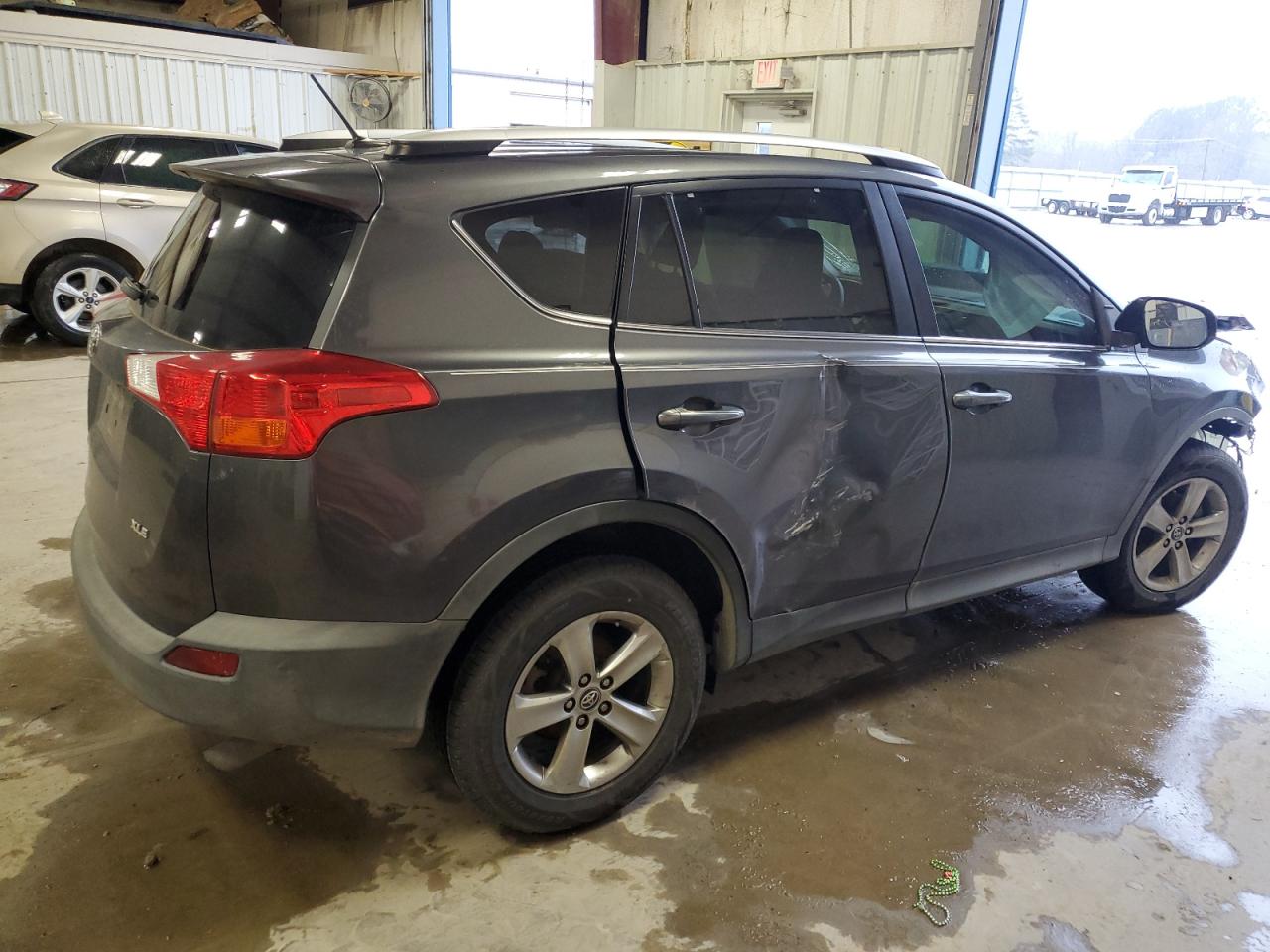 2015 Toyota RAV 4 VIN 2T3WFREV7FW166022 Copart auction photo, front end / side damage thumbnail 3