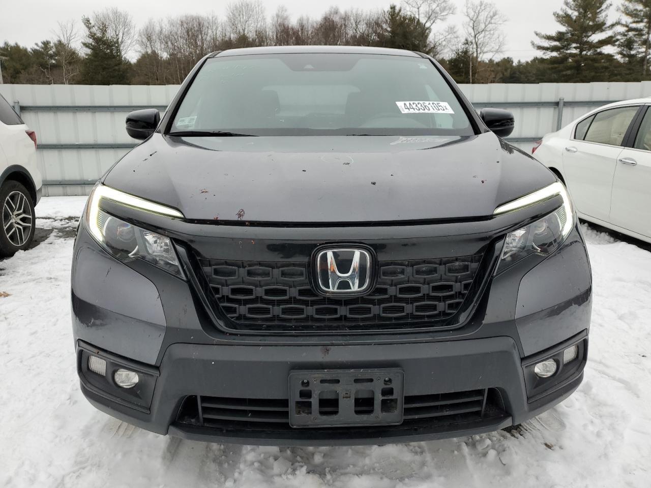 2021 Honda Passport VIN 5FNYF8H28MB017934 Copart auction photo, all over damage thumbnail 5