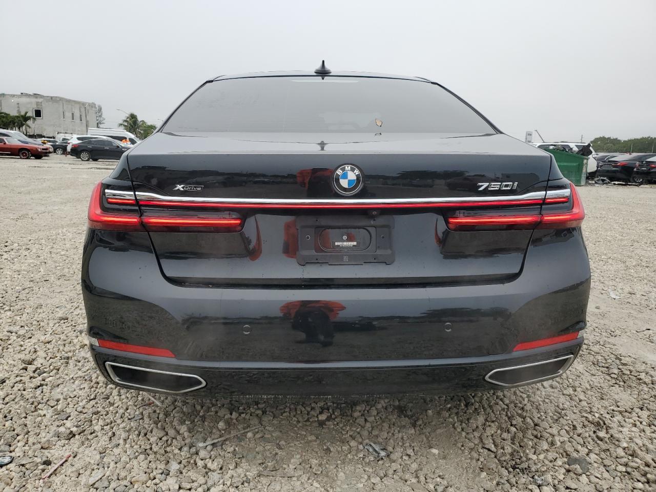 2022 BMW 7er VIN WBA7U2C02NCJ27538 Copart auction photo, side / undercarriage damage thumbnail 6