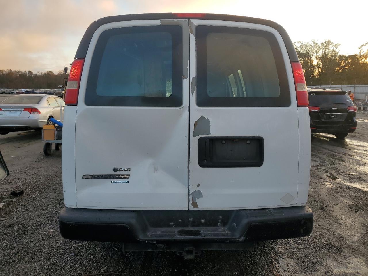 2012 Chevrolet Express VIN 1GCWGFCB9C1117578 Copart auction photo, top/roof damage thumbnail 6