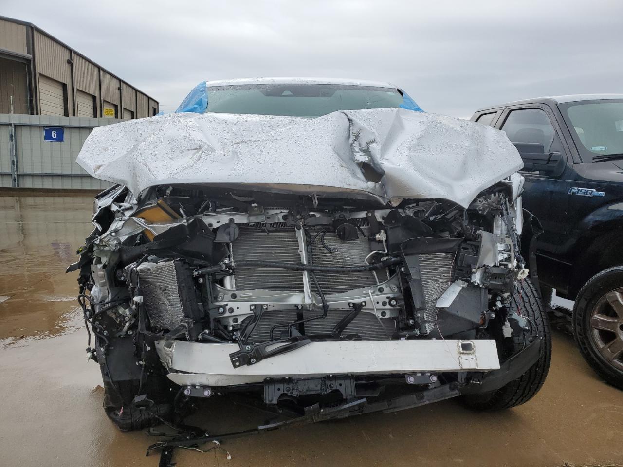 2025 Toyota Tundra VIN 5TFLA5AB0SX042380 Copart auction photo, front end / hail damage thumbnail 5