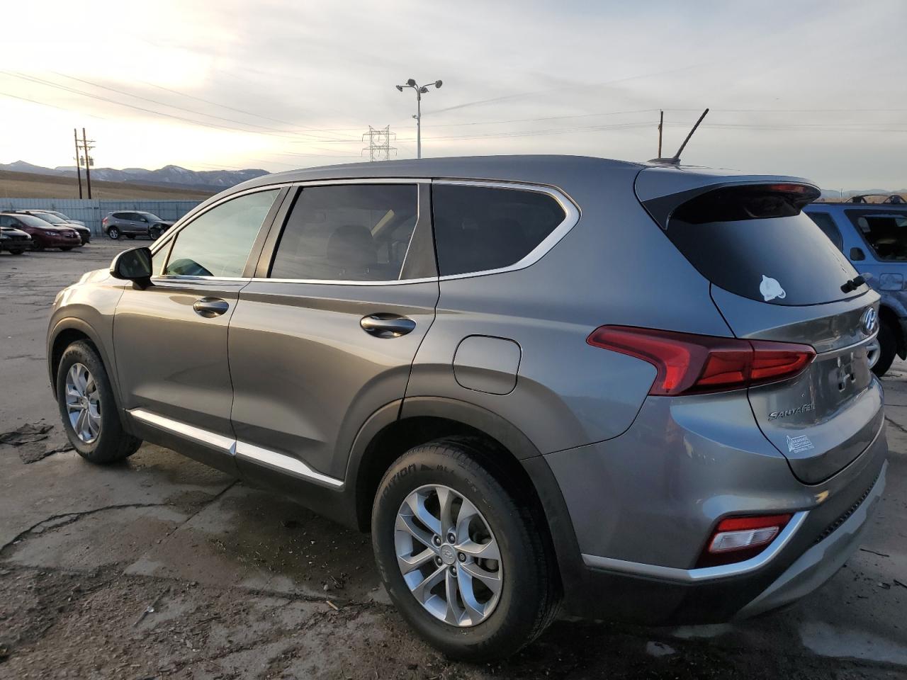 2019 Hyundai Santa Fe VIN 5NMS2CADXKH031104 Copart auction photo, hail / front end damage thumbnail 2