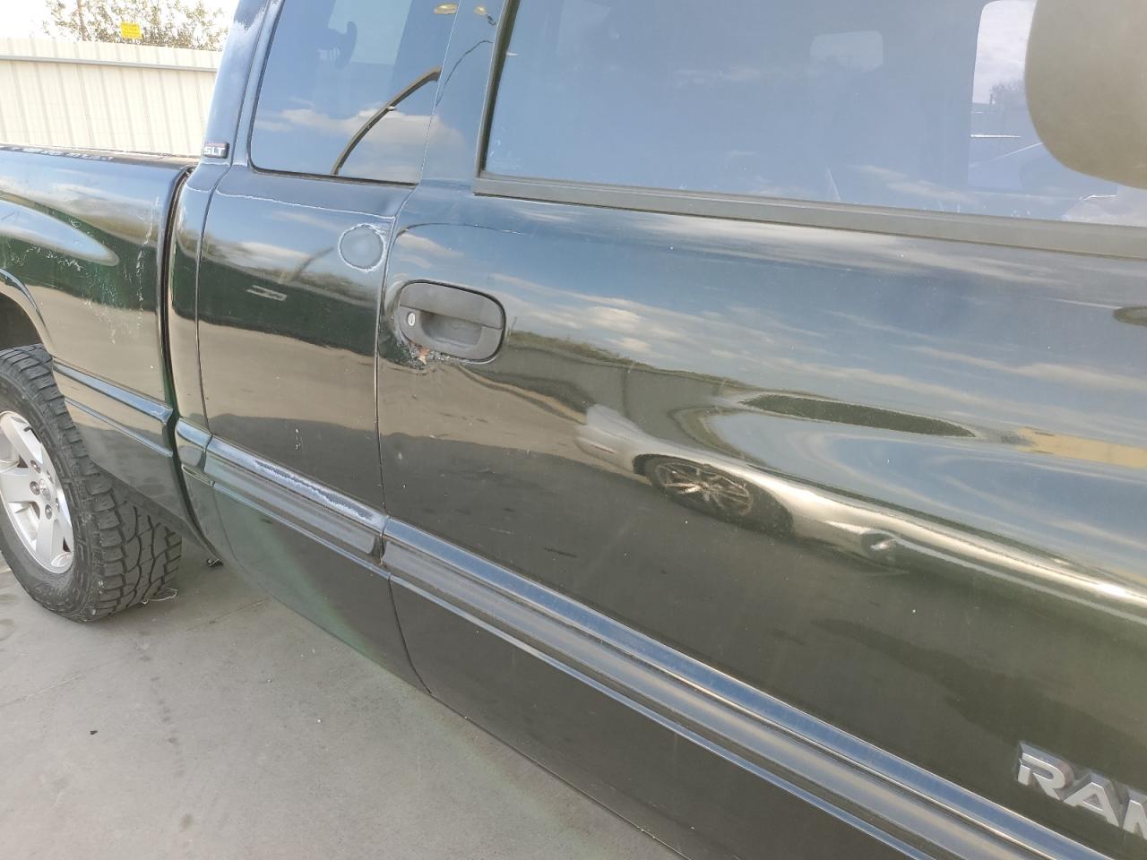 2000 Dodge RAM VIN 3B7HC13YXYG104164 Copart auction photo, side / hail damage thumbnail 10