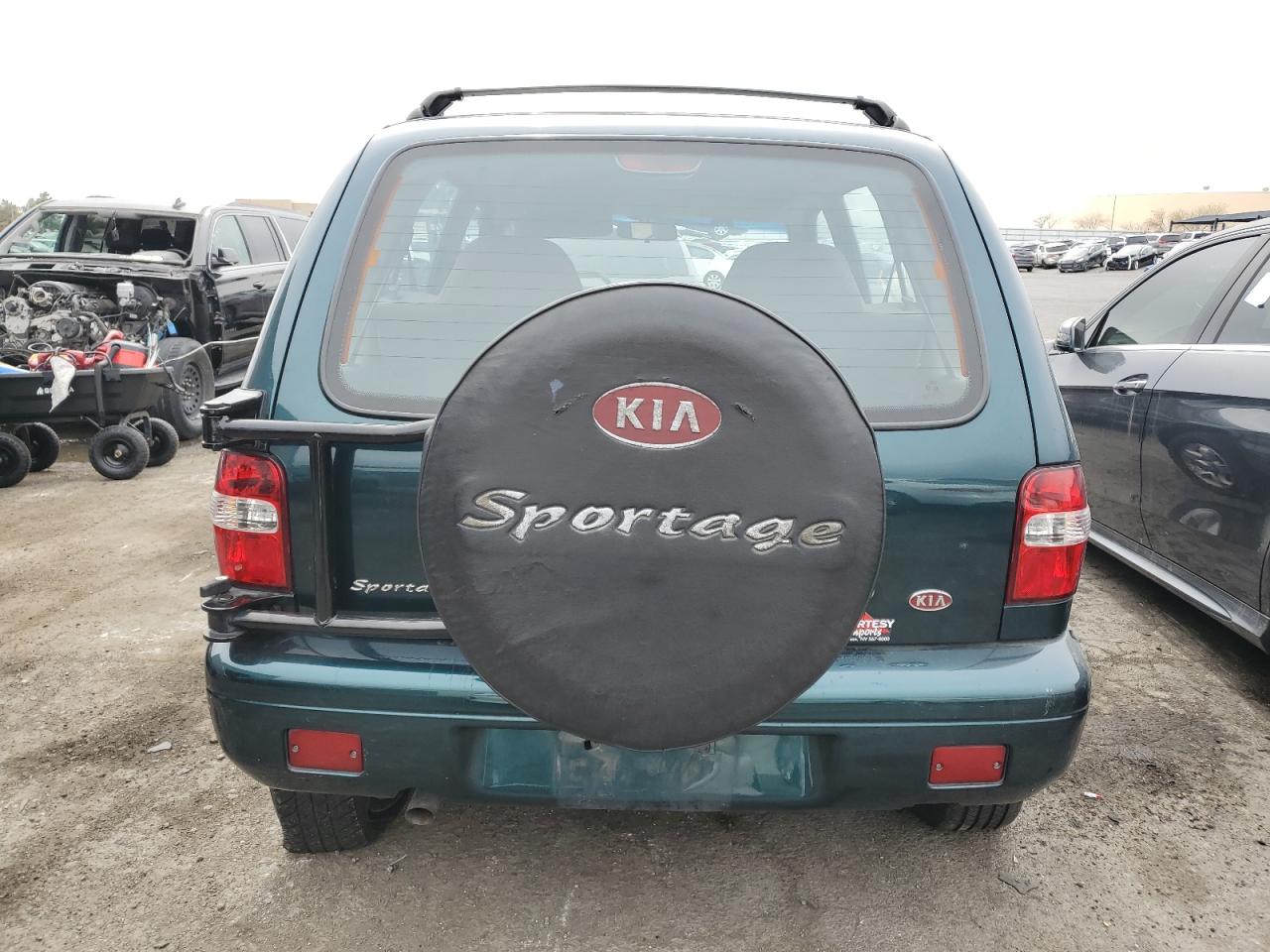 1999 KIA Sportage VIN KNDJB7232X5612065 Copart auction photo, mechanical damage thumbnail 6