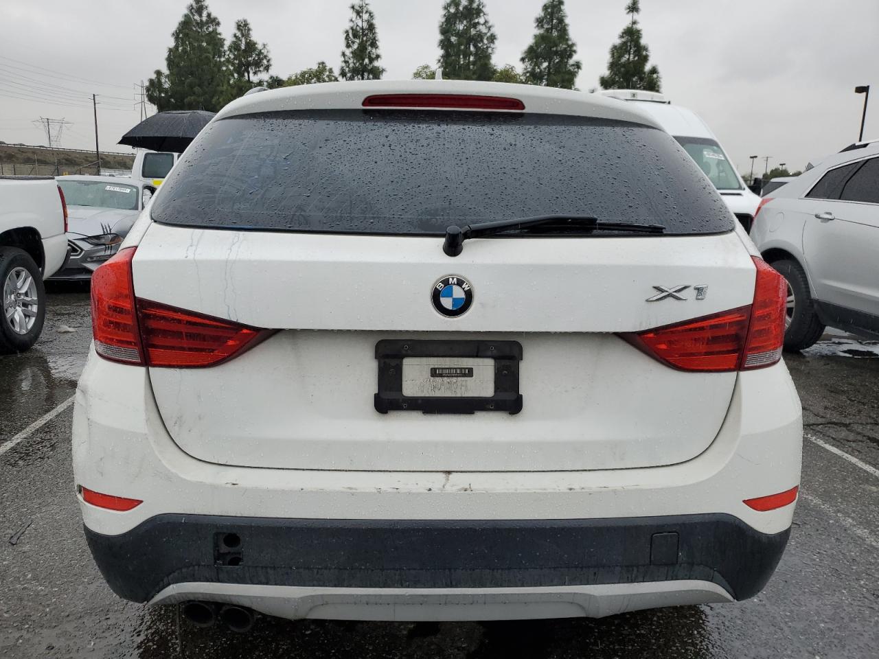 2014 BMW X1 VIN WBAVM1C54EVW49427 Copart auction photo, vandalism damage thumbnail 6