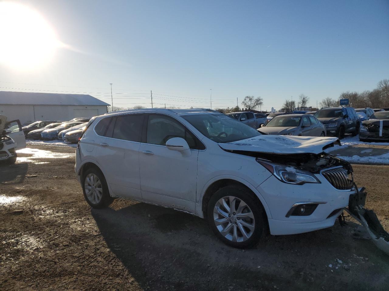 2017 Buick Envision VIN LRBFXESXXHD242990 Copart auction photo, front end / side damage thumbnail 4