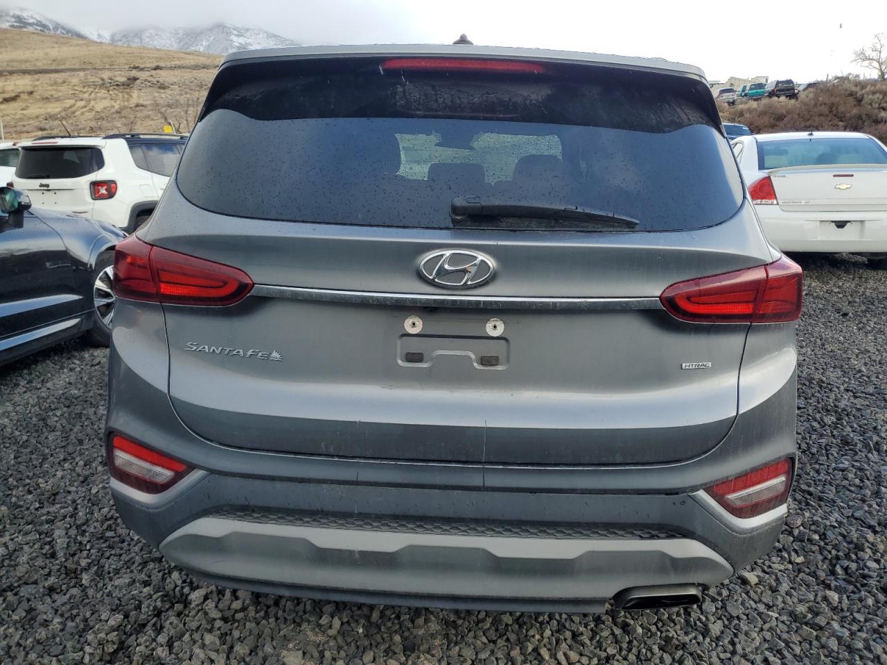2019 Hyundai Santa Fe VIN 5NMS2CADXKH107839 Copart auction photo, all over damage thumbnail 6
