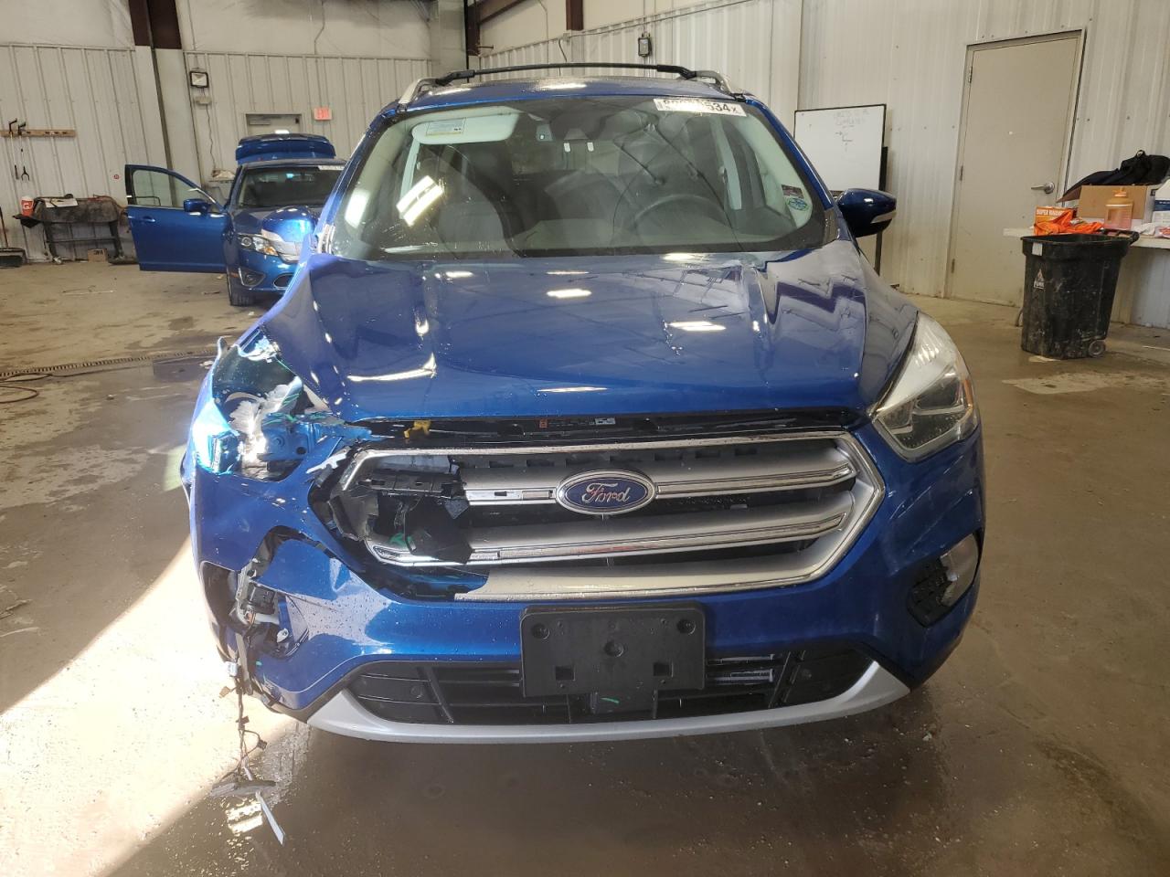 2017 Ford Escape VIN 1FMCU9J92HUD39930 Copart auction photo, front end / side damage thumbnail 5