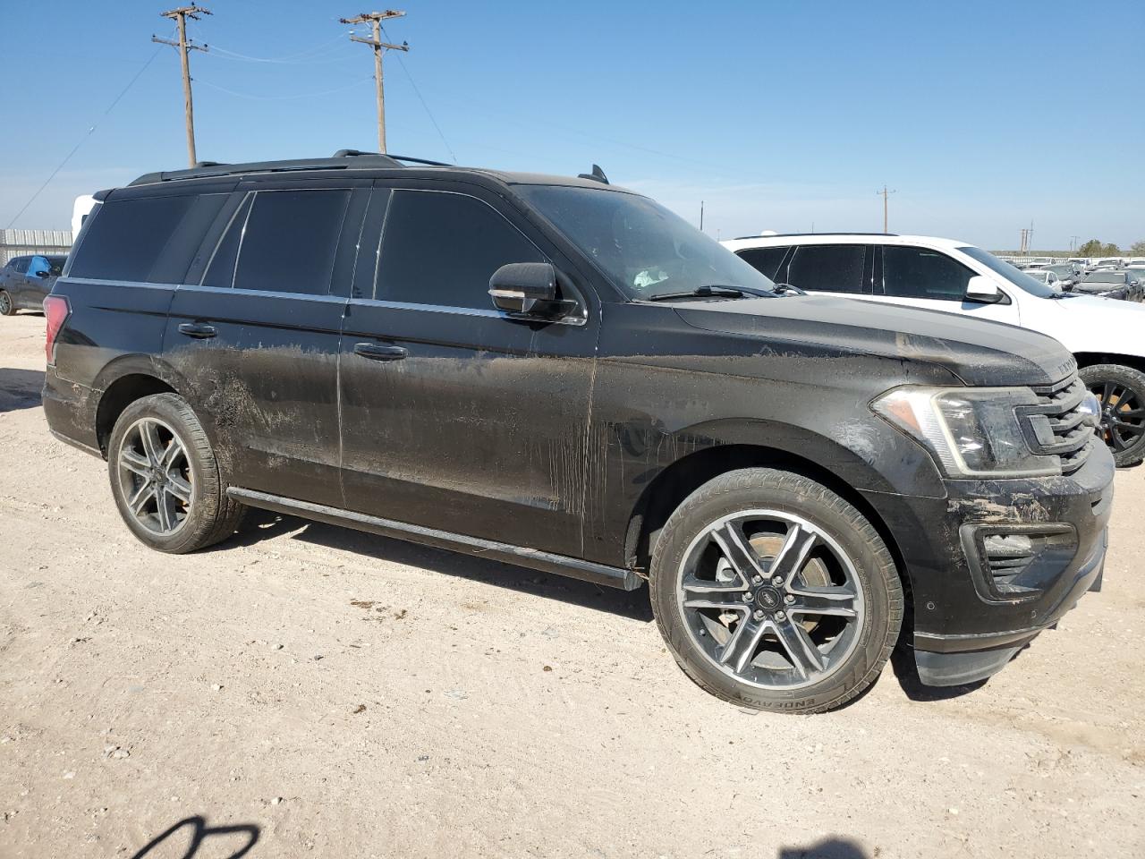 2019 Ford Expedition VIN 1FMJU2AT9KEA83460 Copart auction photo, water/flood damage thumbnail 4