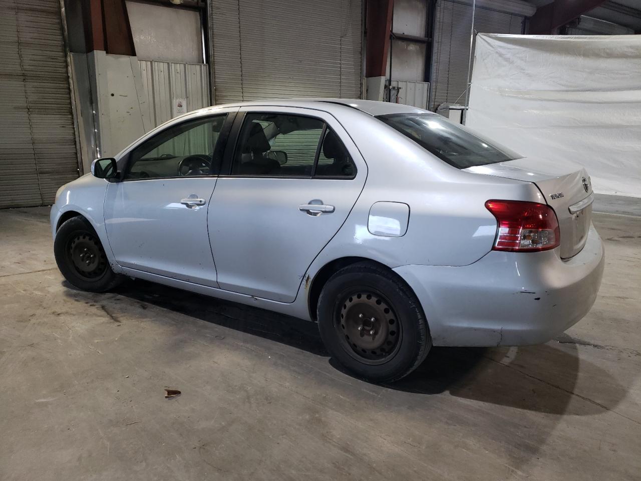2010 Toyota Yaris VIN JTDBT4K3XA1382385 Copart auction photo, side damage thumbnail 2
