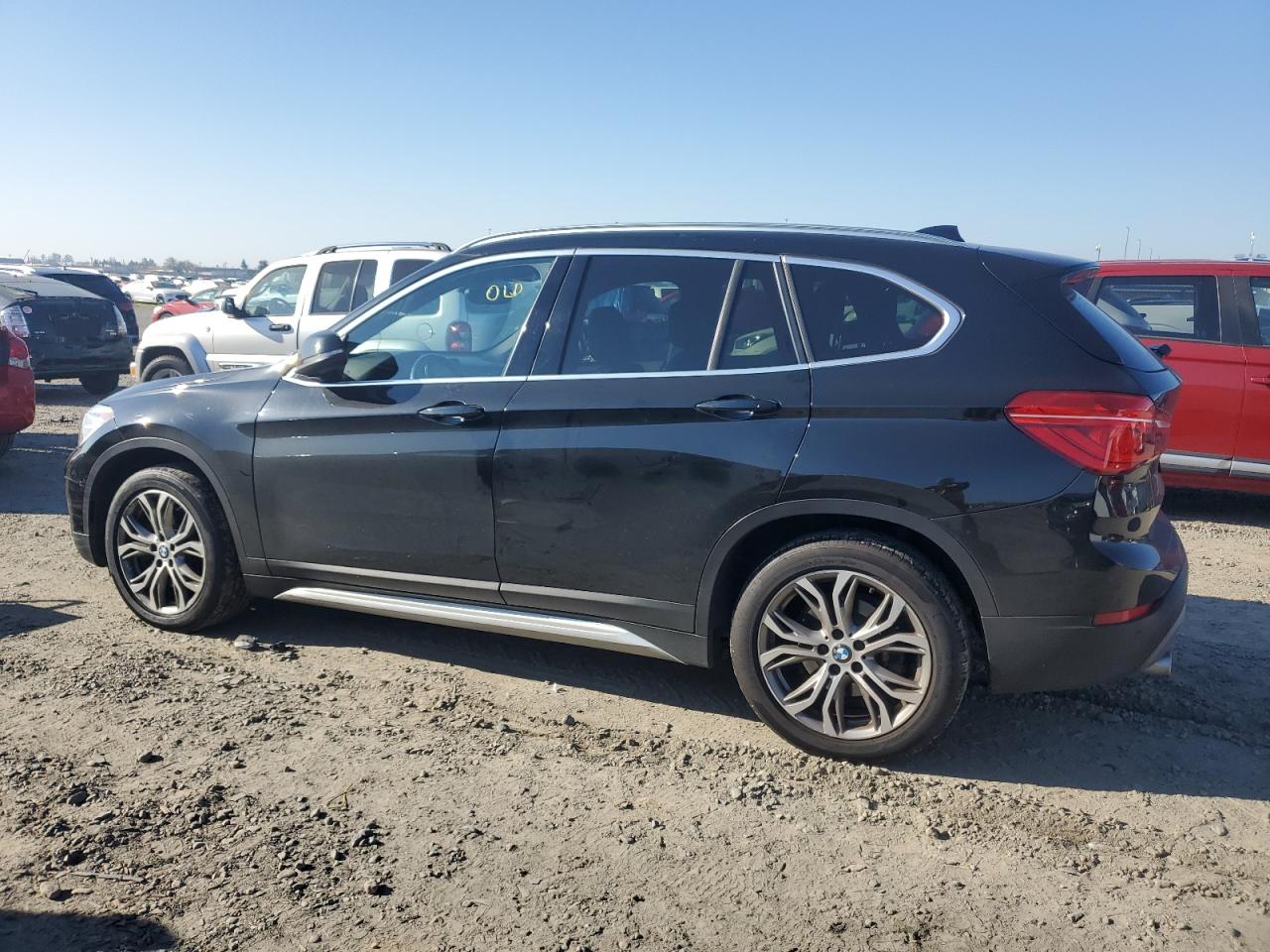 2017 BMW X1 VIN WBXHT3Z38H4A56710 Copart auction photo, front end / side damage thumbnail 2