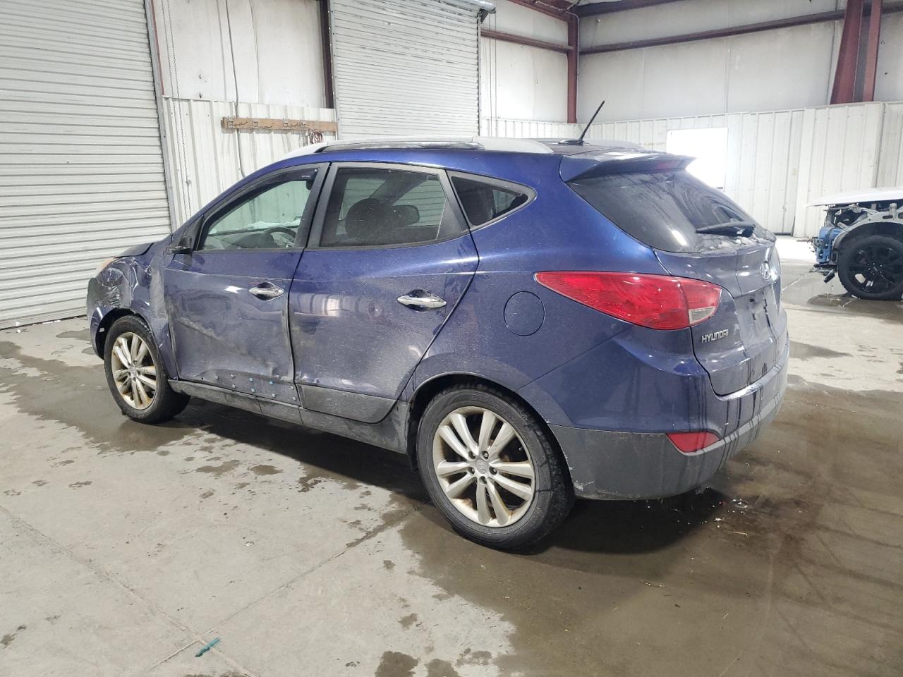 2011 Hyundai Tucson VIN KM8JUCAC4BU316589 Copart auction photo, front end damage thumbnail 2