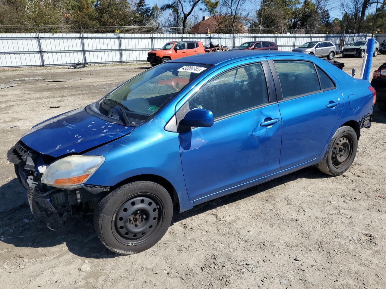 2009 Toyota Yaris VIN JTDBT903194060115 - Copart auction photo