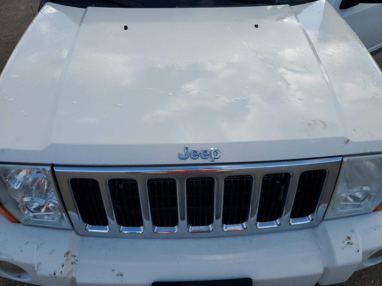 2007 Jeep Commander VIN 1J8HG58257C550300 Copart auction photo, side / front end damage thumbnail 12