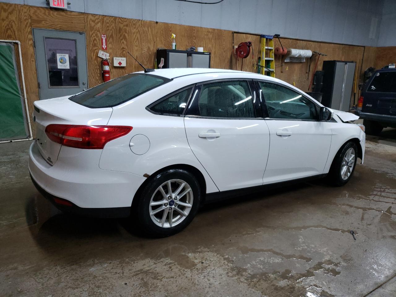 2016 Ford Focus VIN 1FADP3F2XGL370099 Copart auction photo, front end / side damage thumbnail 3