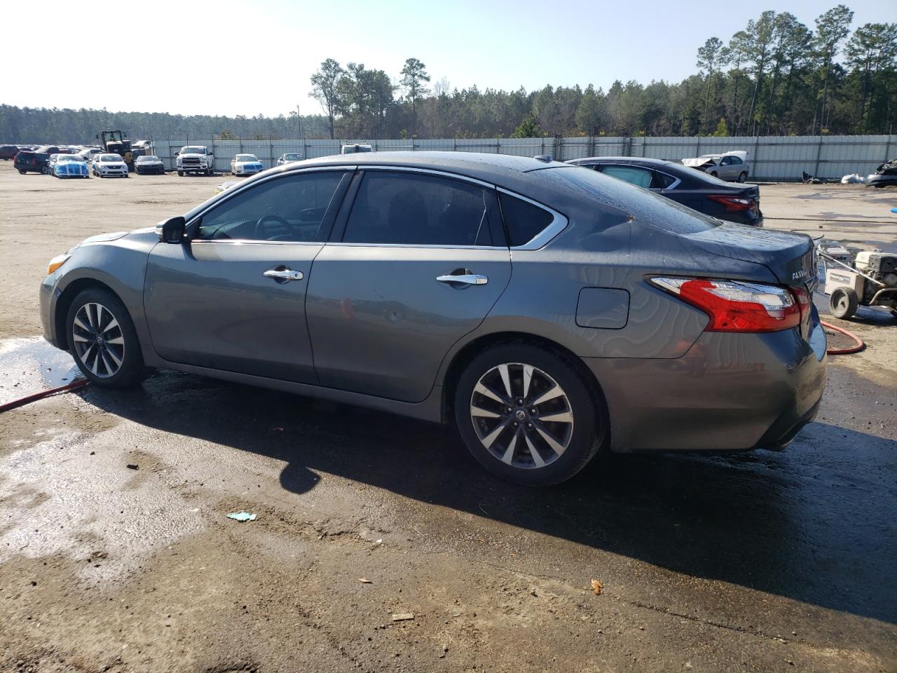 2017 Nissan Altima VIN 1N4AL3AP9HC206927 Copart auction photo, vandalism / rear end damage thumbnail 2
