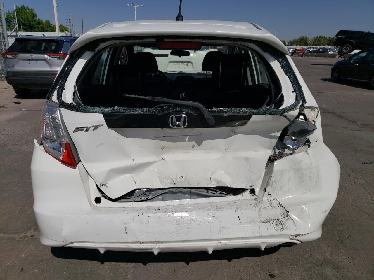 2012 Honda Fit VIN JHMGE8H51CC019012 Copart auction photo, rear end / minor dent/scratches damage thumbnail 6