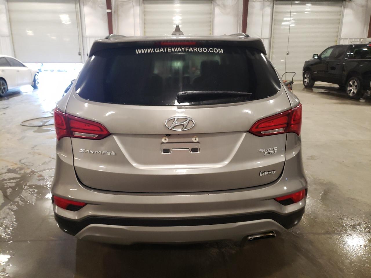 2017 Hyundai Santa Fe VIN 5NMZUDLB7HH023335 Copart auction photo, front end damage thumbnail 6