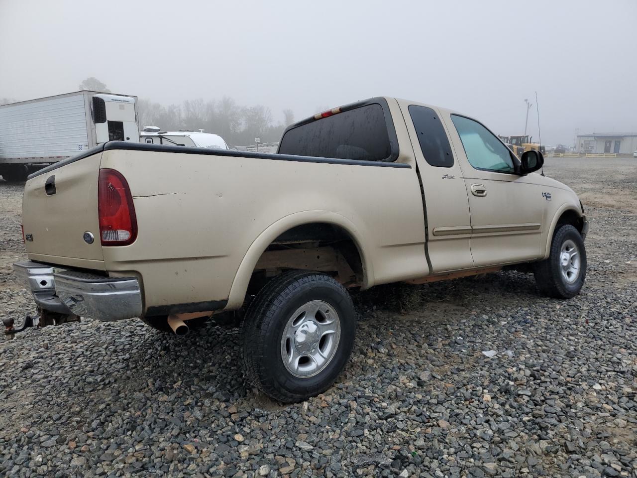 1999 Ford F-150 VIN 1FTRX18L7XNB64656 Copart auction photo, all over damage thumbnail 3
