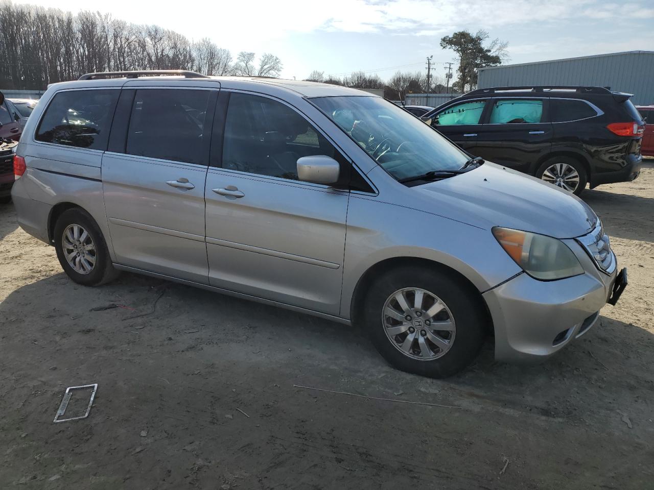 2010 Honda Odyssey VIN 5FNRL3H7XAB032796 Copart auction photo, side damage thumbnail 4