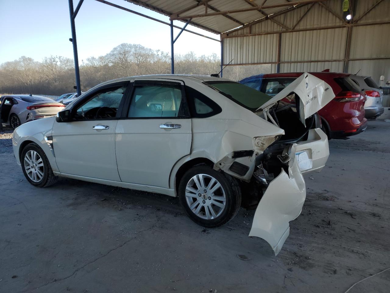 2009 Ford Focus VIN 1FAHP37N59W235480 Copart auction photo, rear end / minor dent/scratches damage thumbnail 2