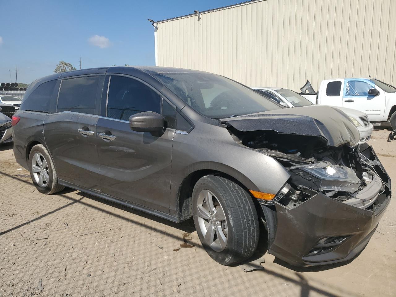 2018 Honda Odyssey VIN 5FNRL6H7XJB020228 Copart auction photo, front end / minor dent/scratches damage thumbnail 4