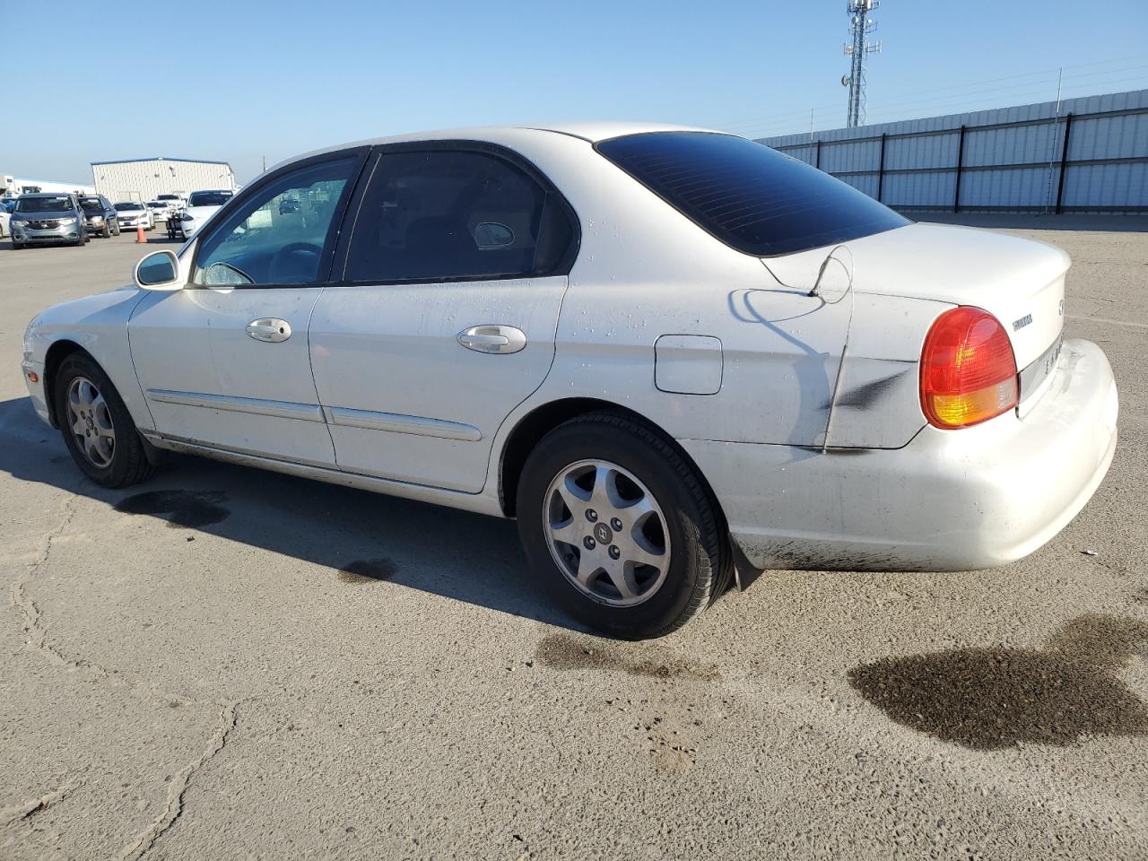 2000 Hyundai Sonata VIN KMHWF35V6YA299512 Copart auction photo, rear end damage thumbnail 2