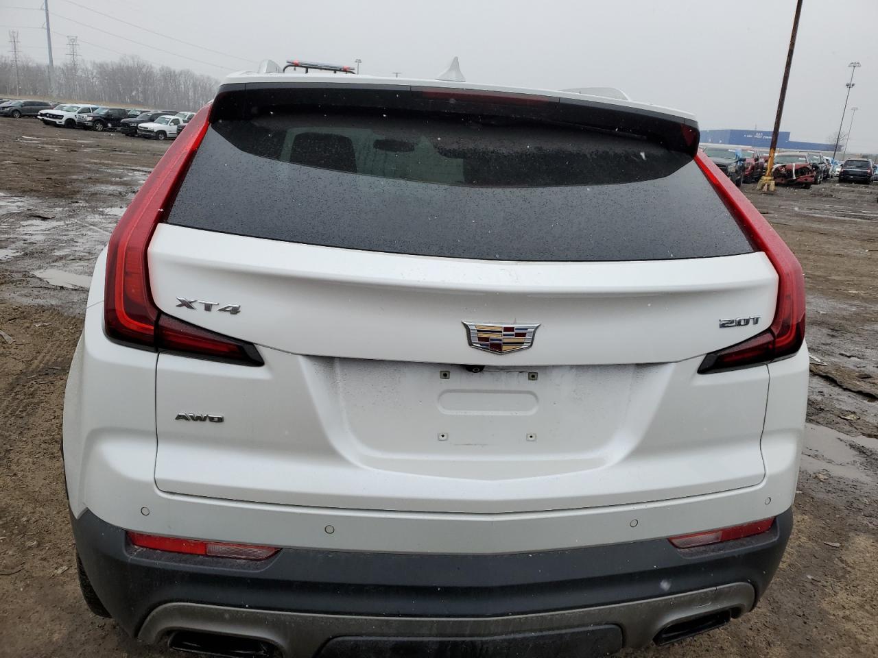 2019 Cadillac XT4 VIN 1GYFZDR4XKF163147 Copart auction photo, all over damage thumbnail 6