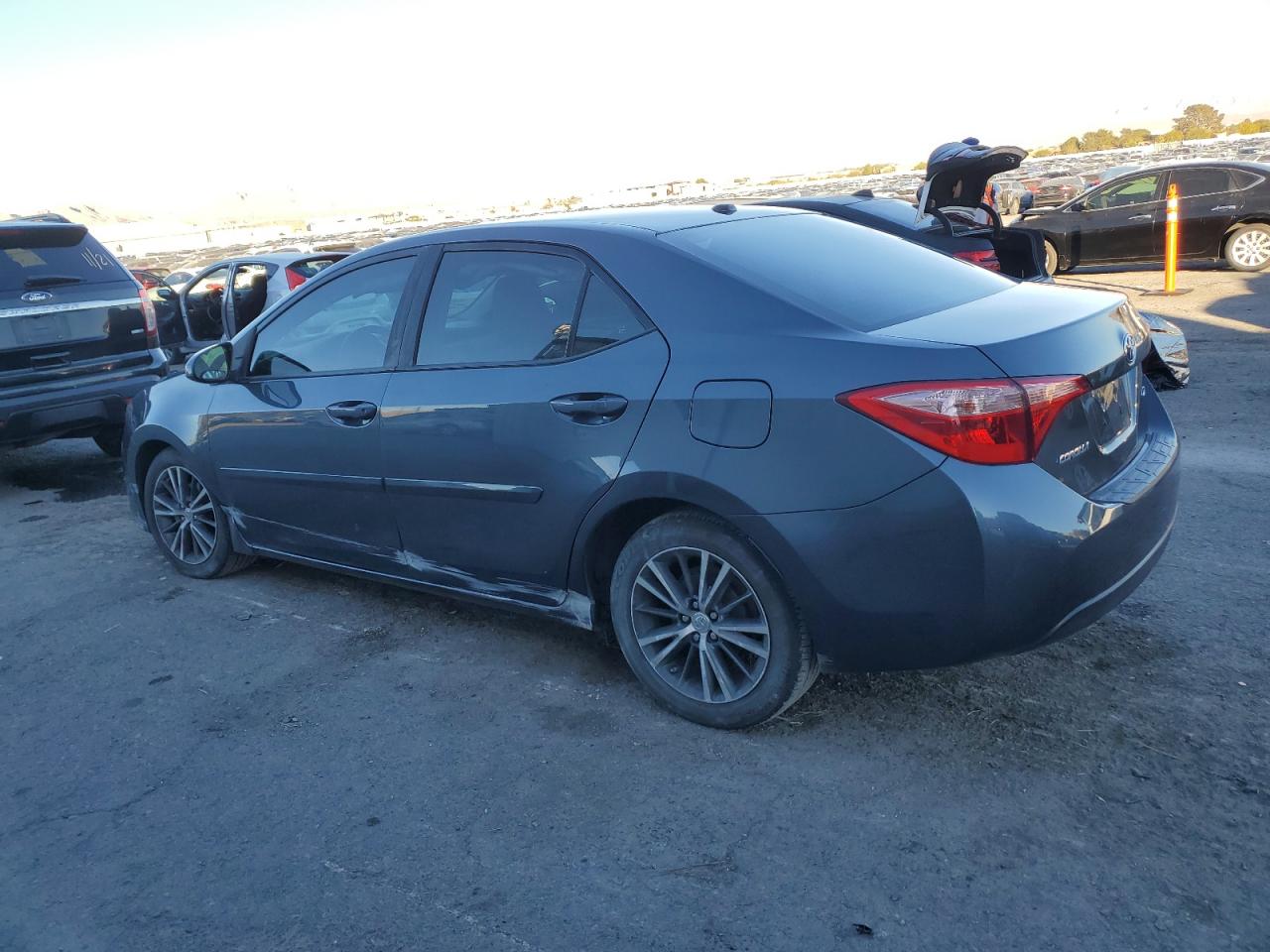 2018 Toyota Corolla VIN 2T1BURHE7JC100721 Copart auction photo, side damage thumbnail 2