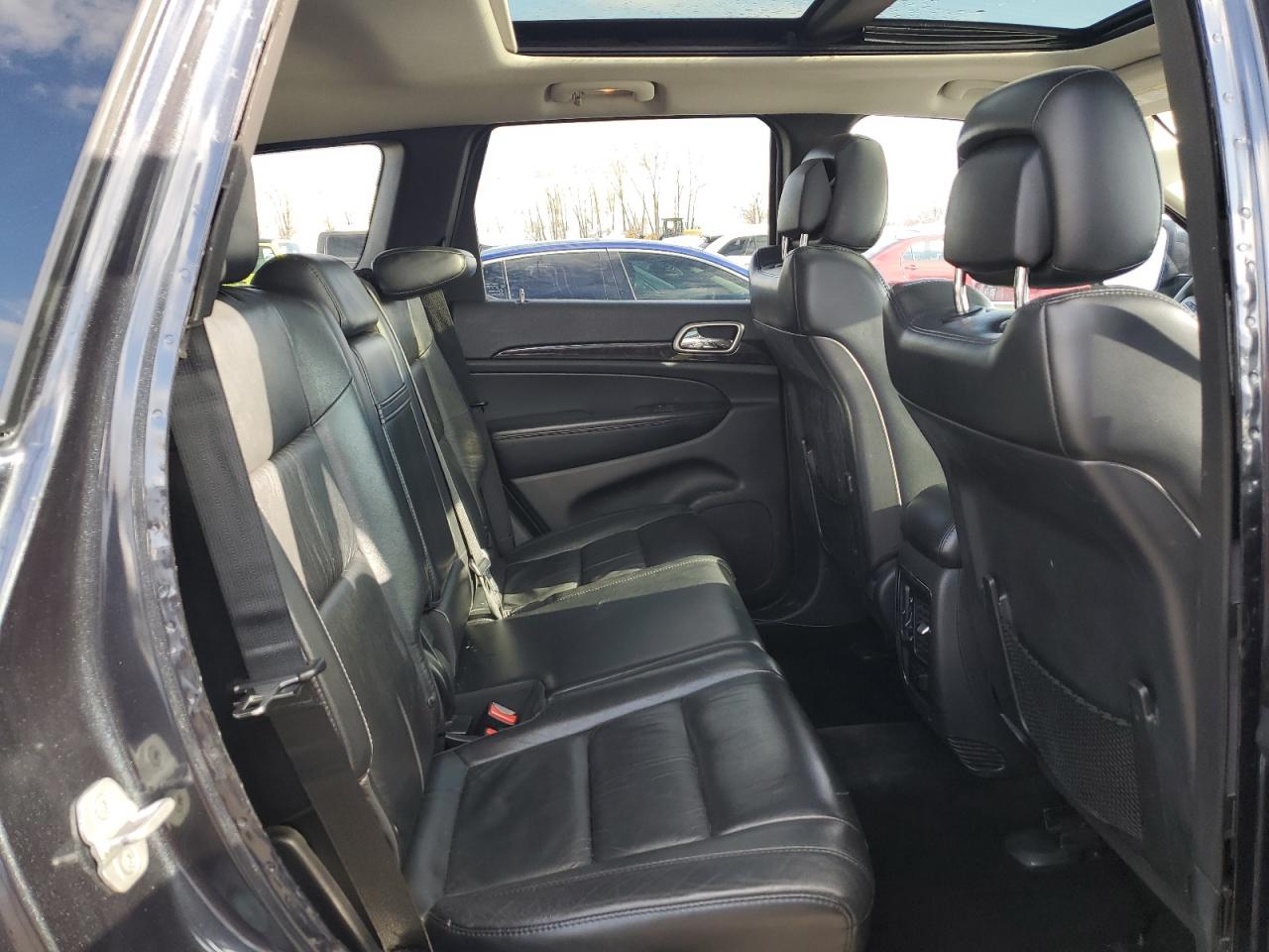 2013 Jeep Grand Cherokee VIN 1C4RJFAG0DC557675 Copart auction photo, hail / rear end damage thumbnail 11