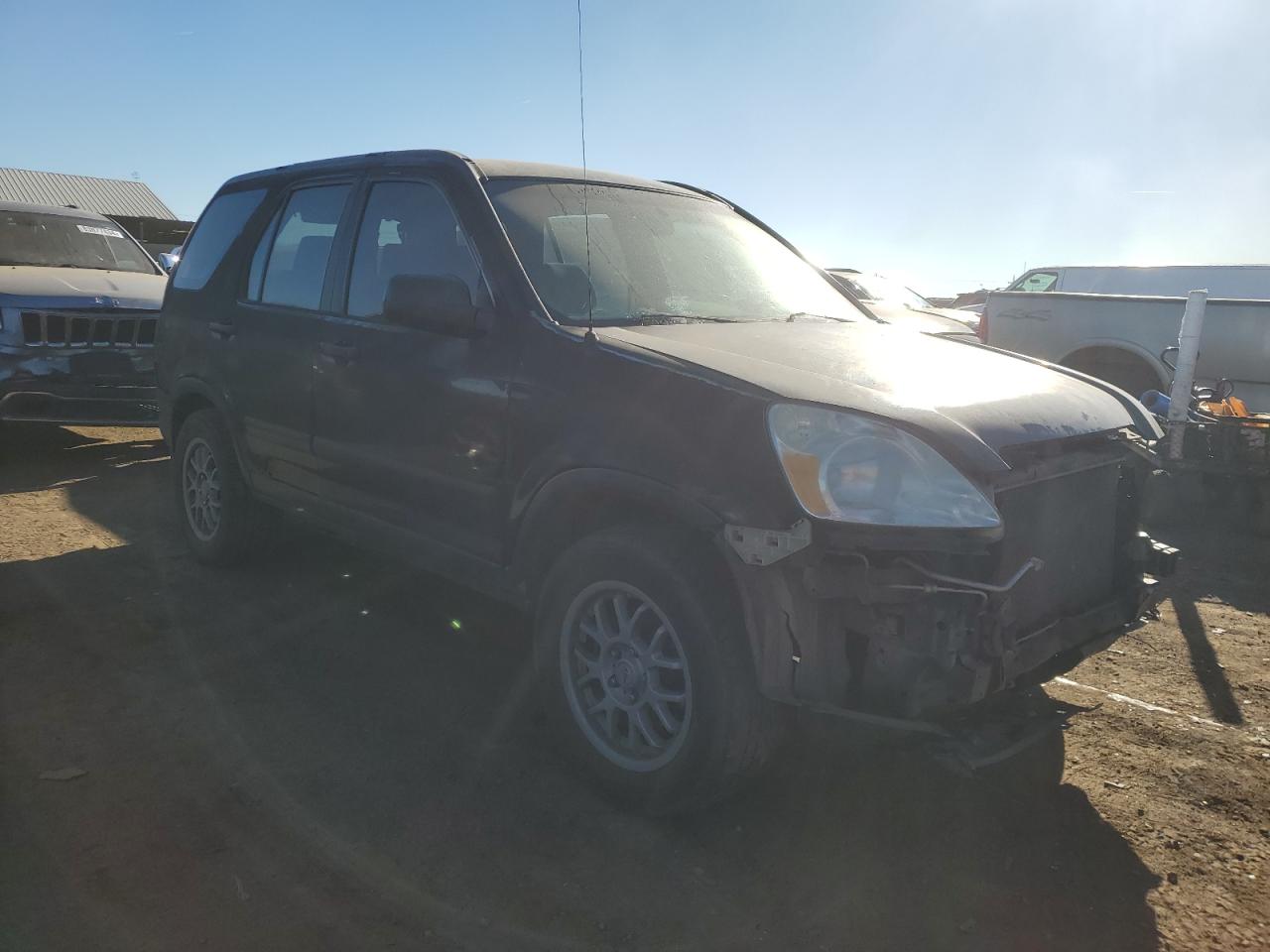 2004 Honda CR-V VIN JHLRD774X4C043703 Copart auction photo, front end / side damage thumbnail 4