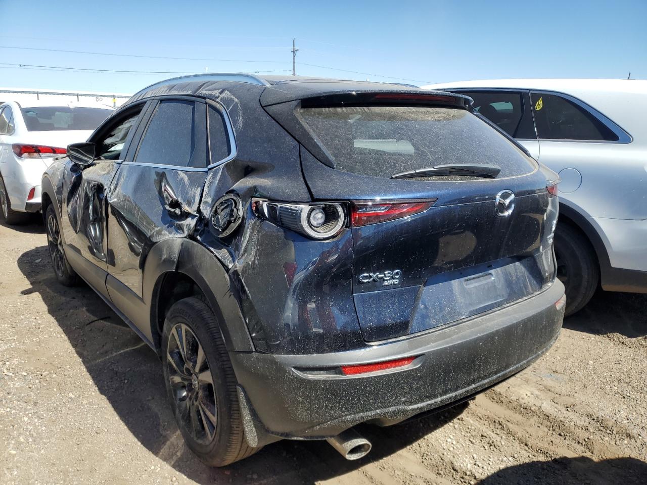 2022 Mazda CX-30 VIN 3MVDMBAYXNM417439 Copart auction photo, all over damage thumbnail 2