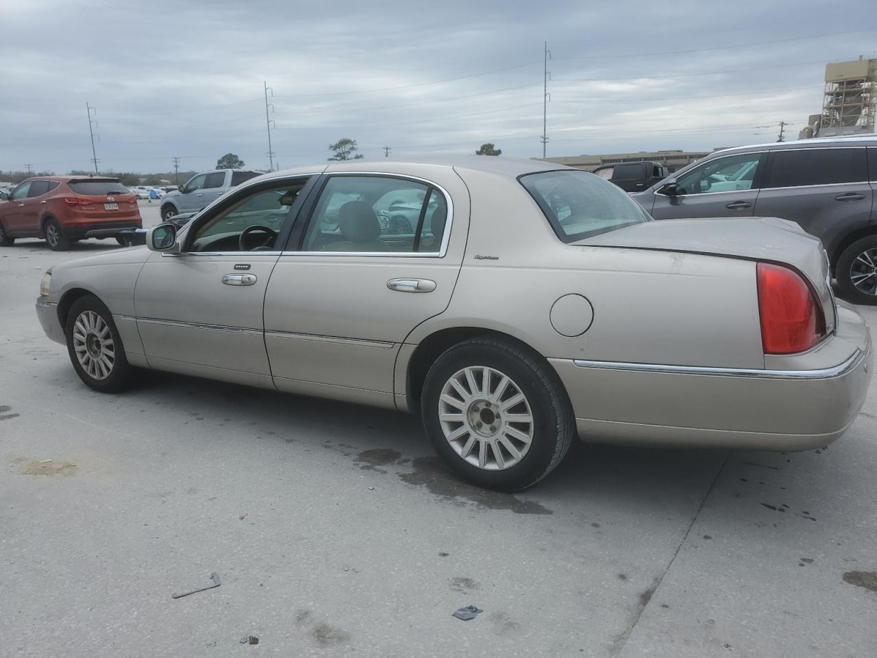 2003 Lincoln Town Car VIN 1LNHM82W83Y616313 Copart auction photo, rear end damage thumbnail 2
