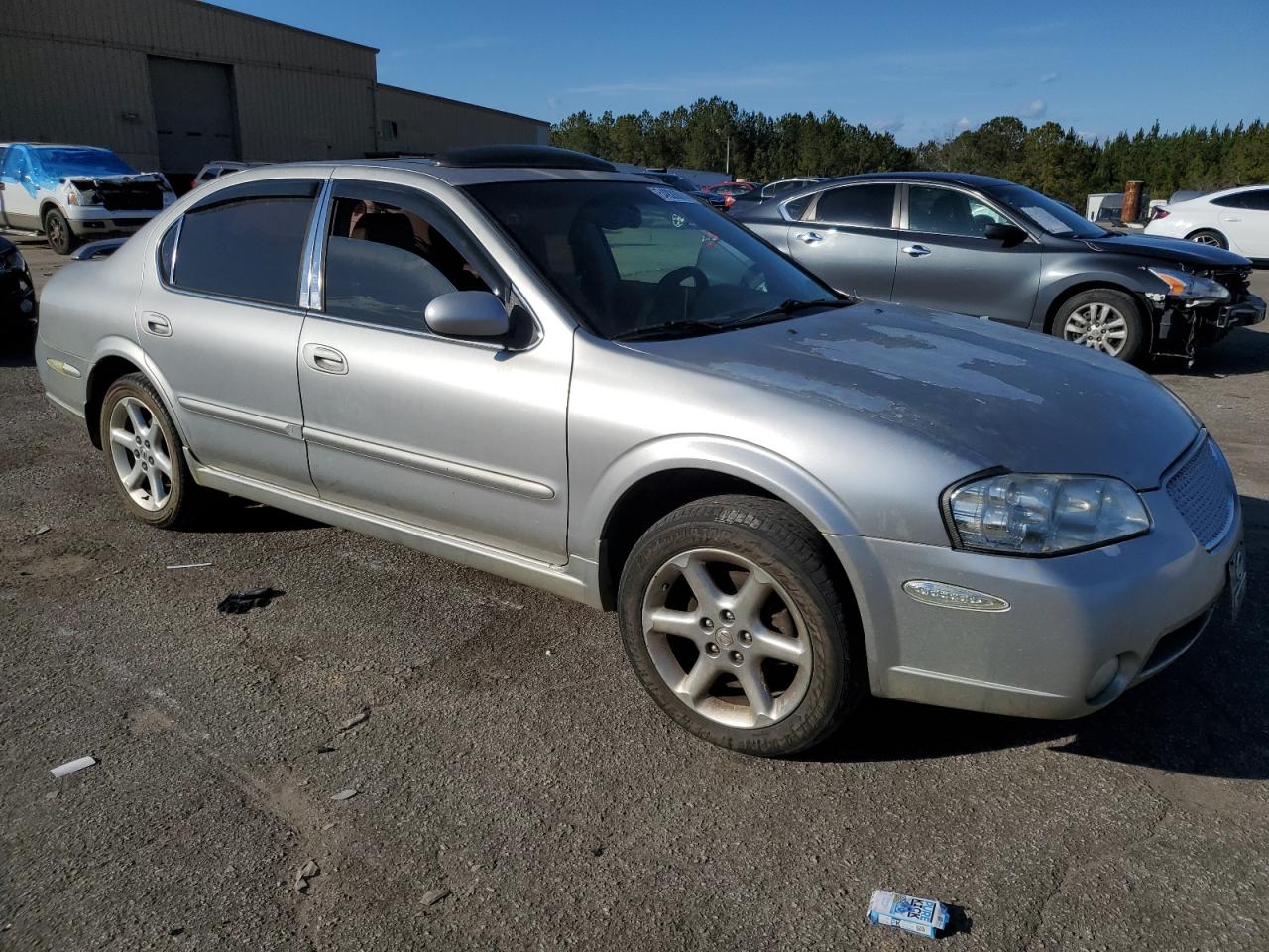 2003 Nissan Maxima VIN JN1DA31A43T404125 Copart auction photo, side / front end damage thumbnail 4