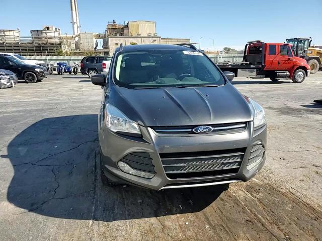 2016 Ford Escape VIN 1FMCU0GX3GUB96907 Copart auction photo, hail / side damage thumbnail 11