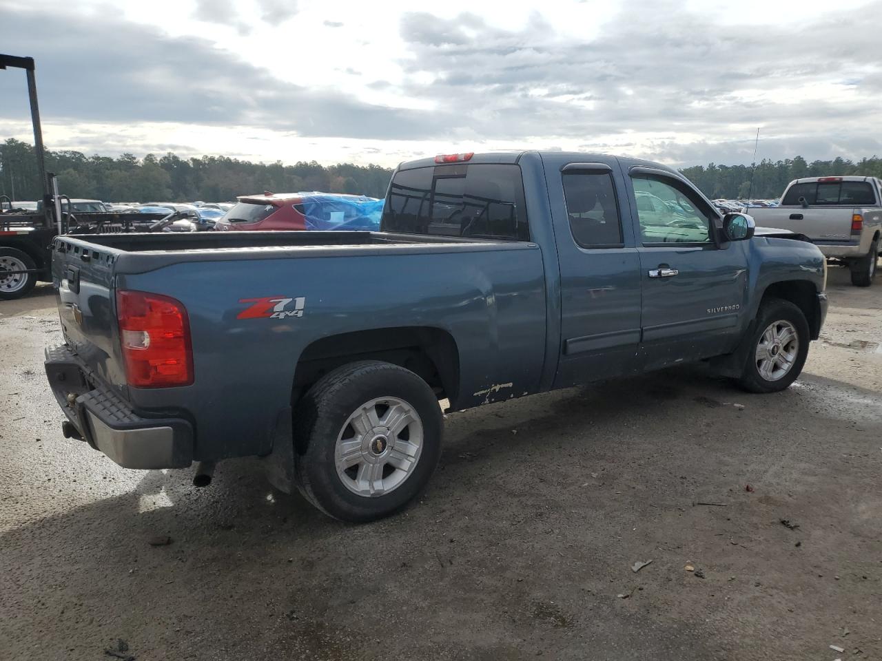 2009 Chevrolet Silverado VIN 1GCEK29009Z296032 Copart auction photo, front end / side damage thumbnail 3